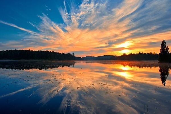 Canada-Quebec-La Mauricie National Park Reflection of clouds in Lac du Fou at sunrise